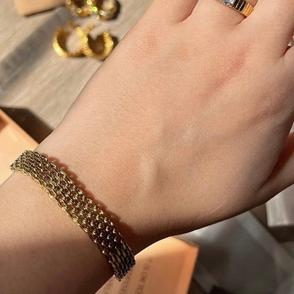 Rowena Bracelet and Cartier Love Bangle